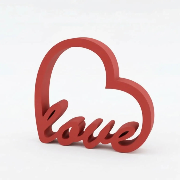 Detail of the Love piece on contemporary wooden furniture in a designer bedroom with soft lighting.