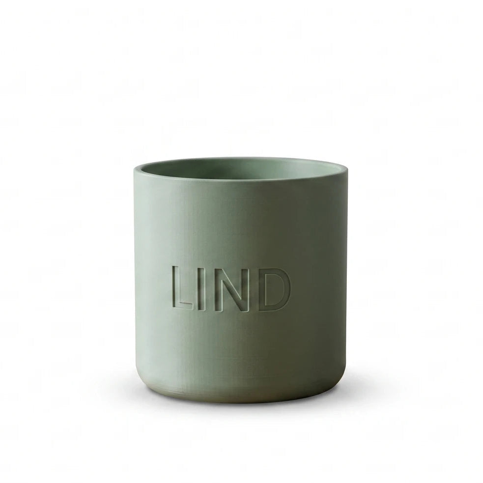 Cylindrical Nordic-style planter in sage green with engraved name
