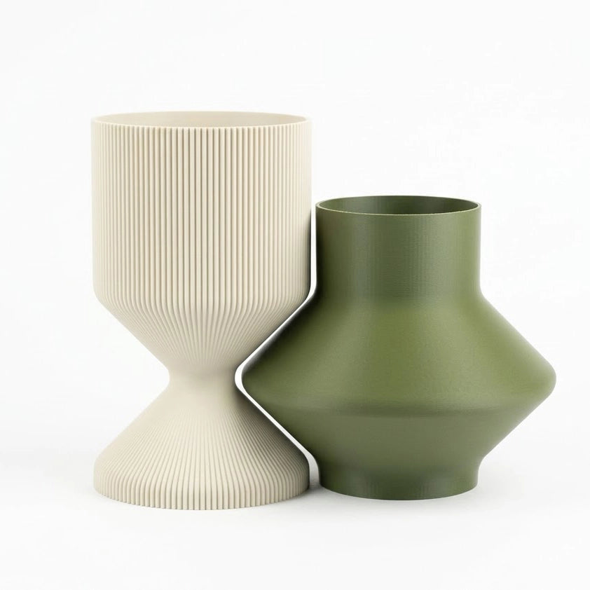 Detail of the precise geometric fit between high-density vases with a non-porous satin finish.